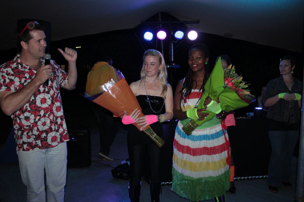 Staff awards on stage at a corporate year-end function run by Blue Hat Events